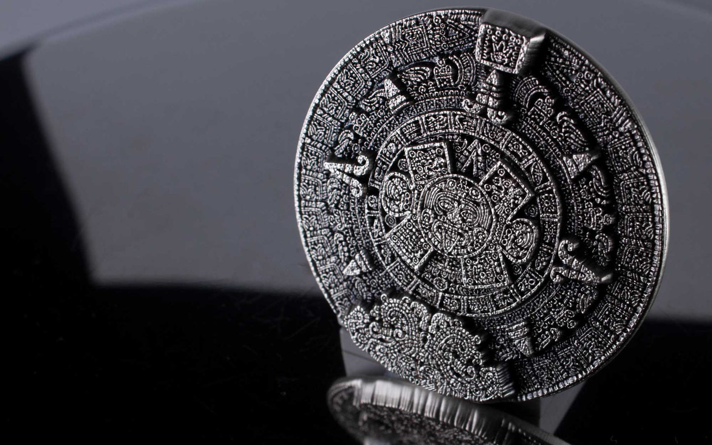 2oz Aztec Sun Stone Silver Stacker – Antique Finish